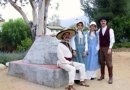 Participants in period dress at the adobe brick oven.